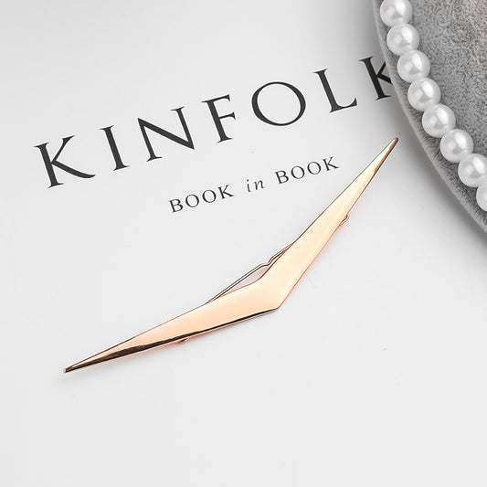 Geometric alloy clip