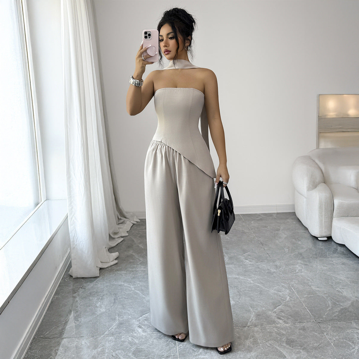 An Elegant And Sophisticated Midriff-baring Top And Bottom Set