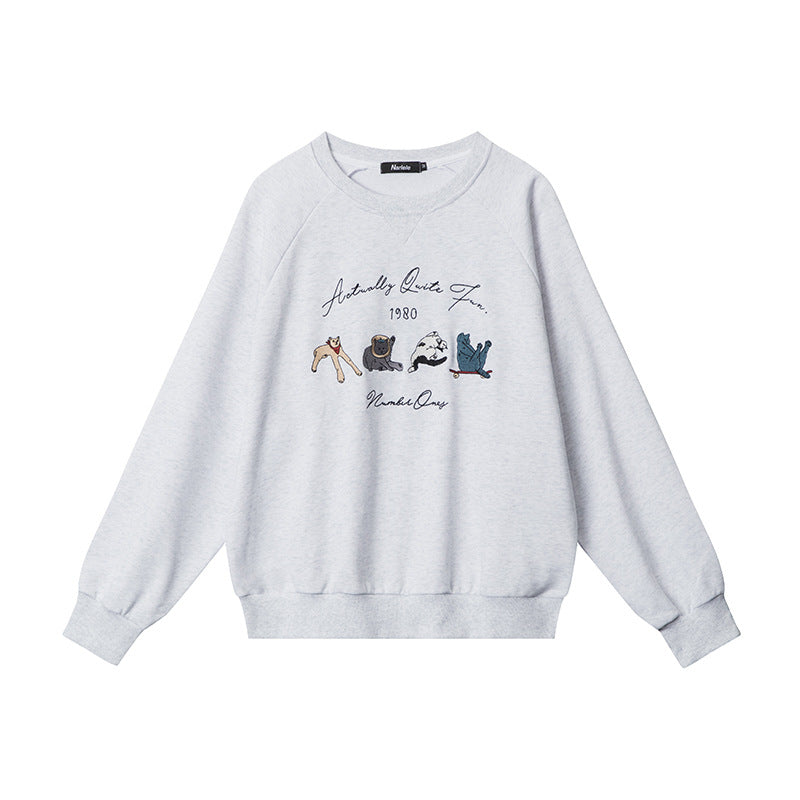 Rundhalset Løs Retrosweater Med Broderet Design Og Lange Ærmer