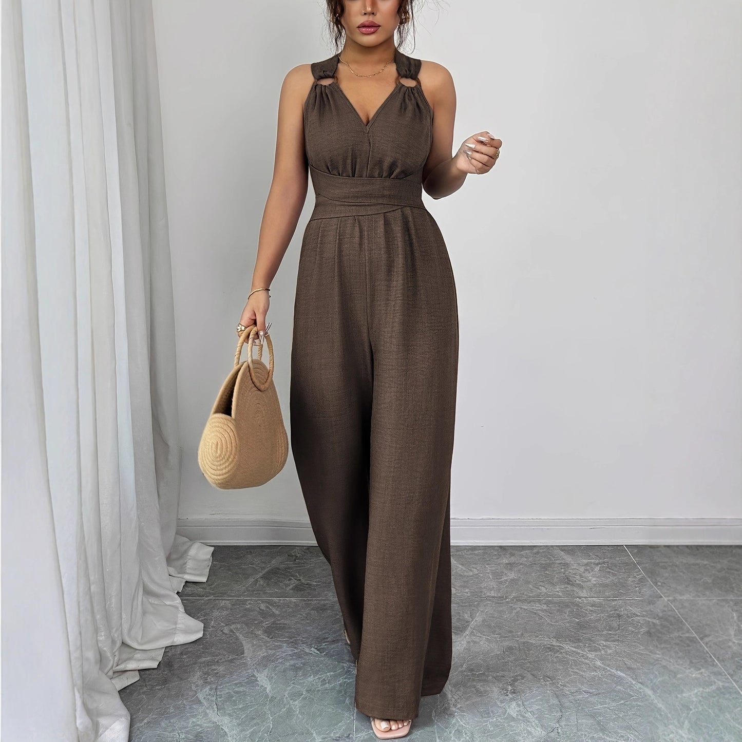 V-udskæring, rygløs, crossover-talje, viddebenet jumpsuit