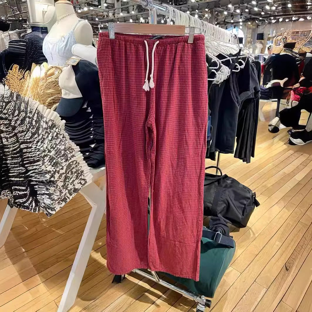 Løse og elastiske casual bukser til kvinder med bindebånd og rødt ternmønster