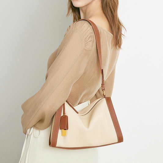 En skulder-crossbody taske er moderne og alsidig