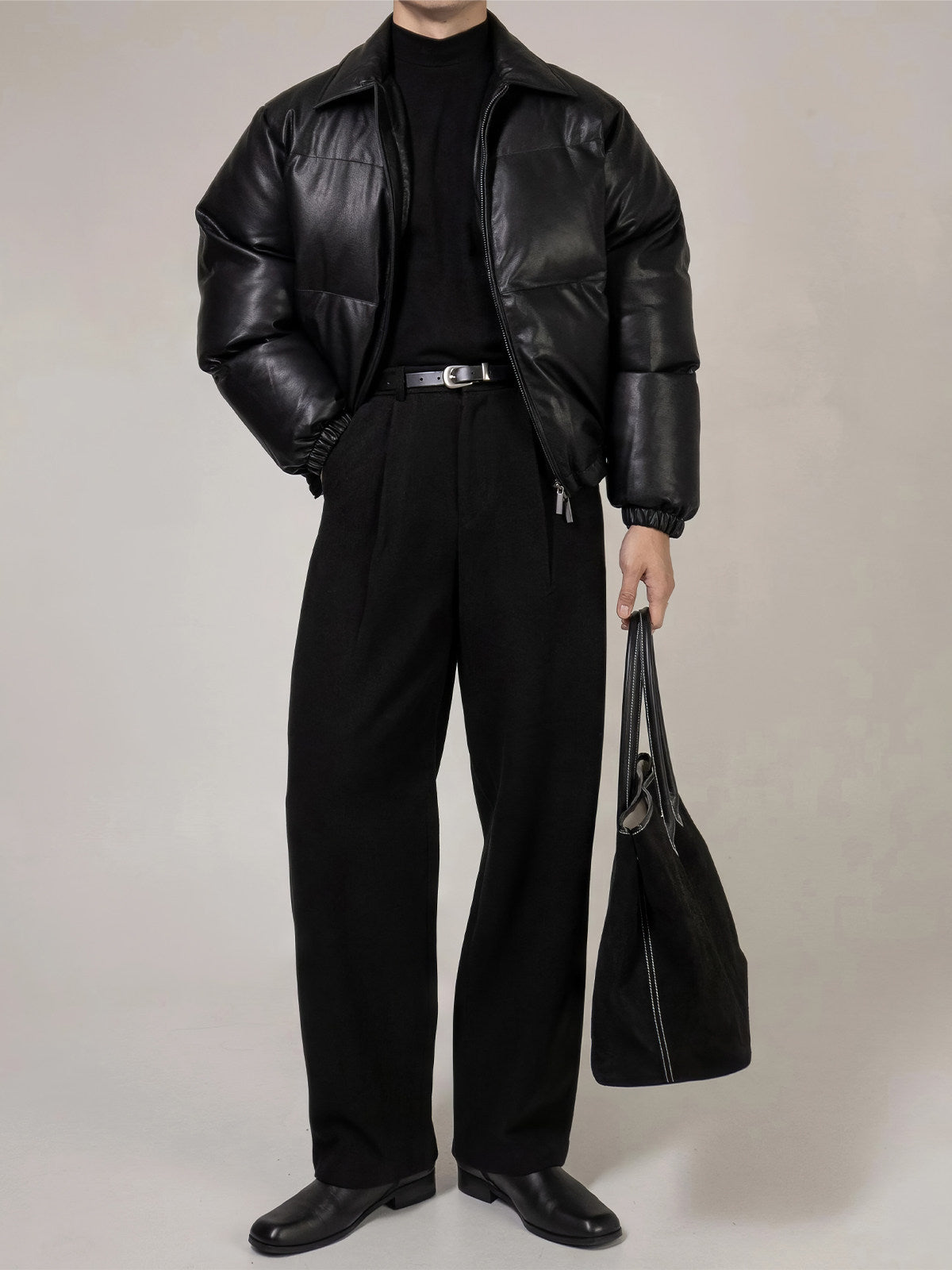 PU Leather Puffer Jacket With A Stand-up Collar And Extra Padding