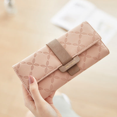 Three-fold wallet with belt buckle