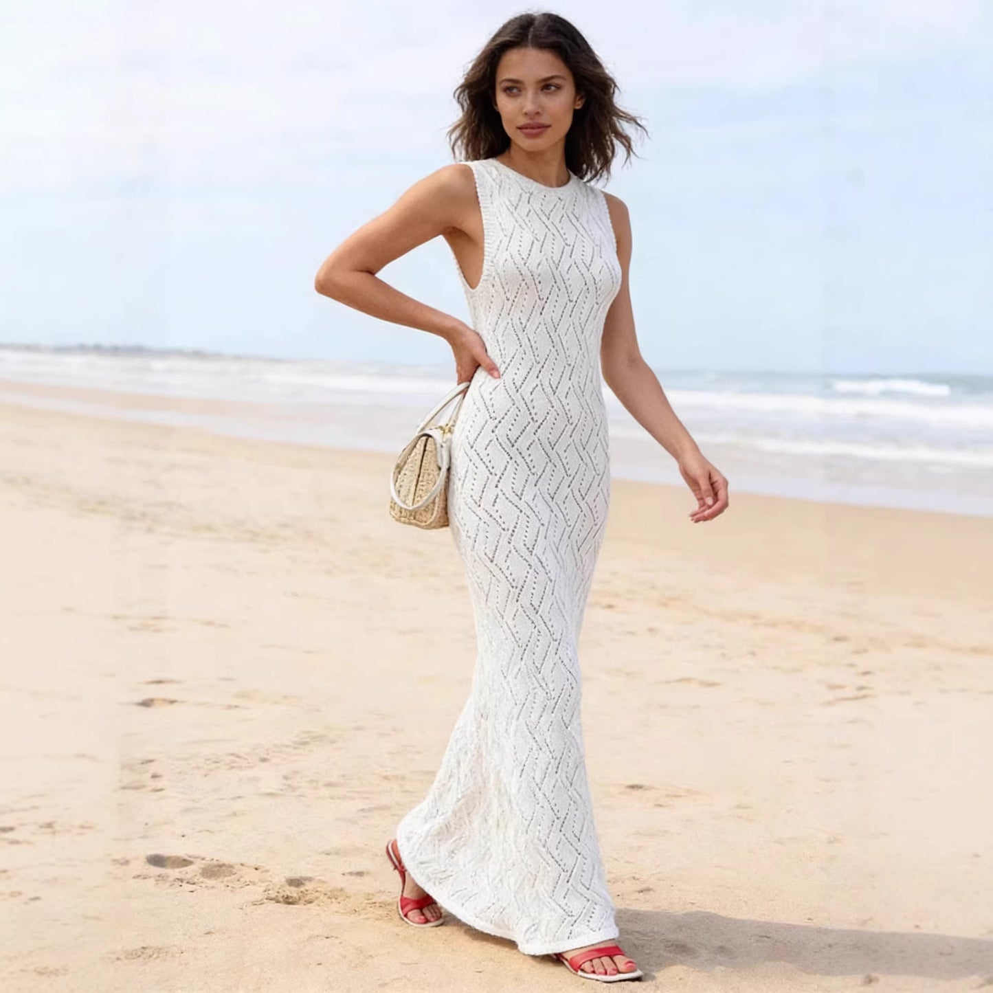 Solid Color Cutout Figure Hugging Knit Dress With A Round Neck And No Sleeves