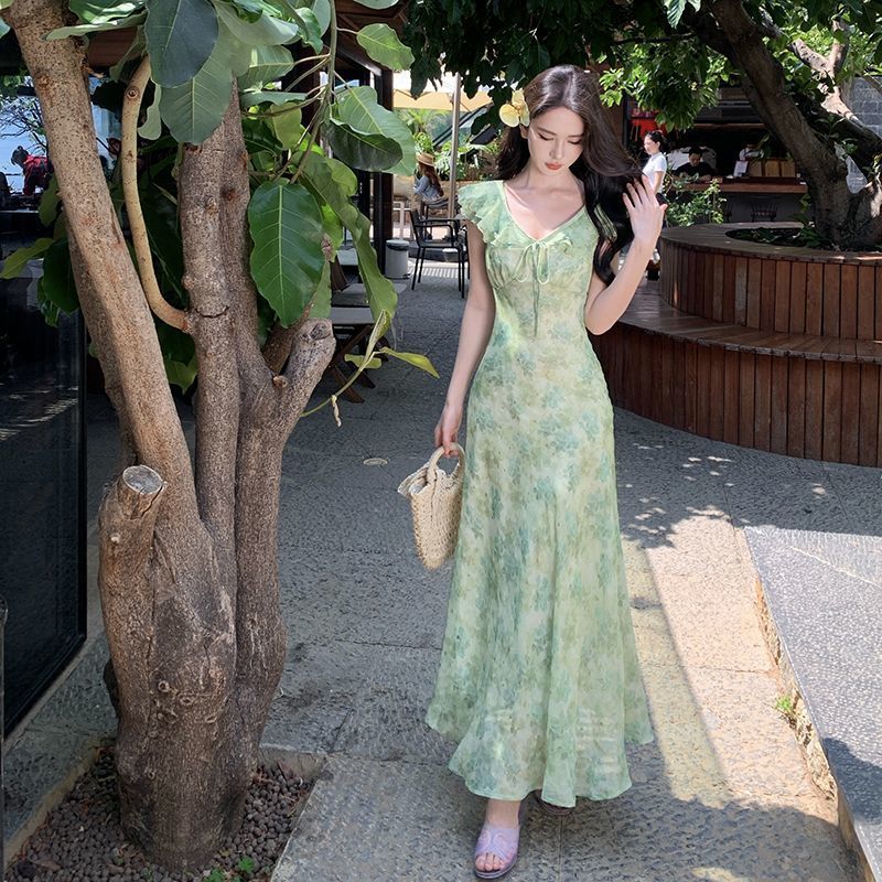 Fresh Beachy Getaway Dress In Green With A Dainty Floral Print And Cap Sleeves
