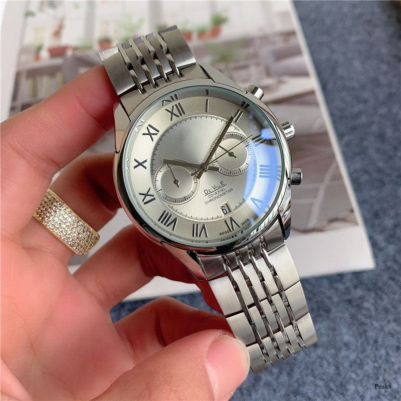 Moderigtigt armbåndsur i rustfrit stål med multifulle femvisere og kalender i trendy afslappet design