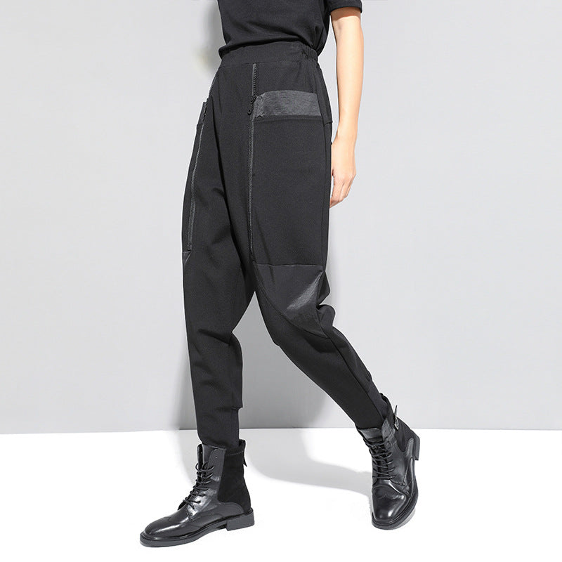 Tapered foot pants with zipper stitching pockets