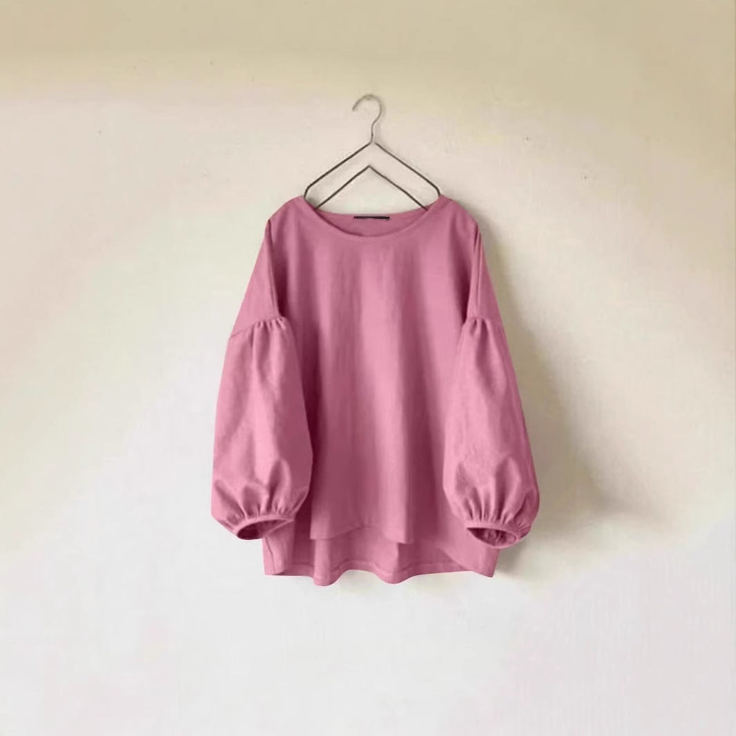 Løstsiddende vintage T-shirt til kvinder med rund hals og pufærmer