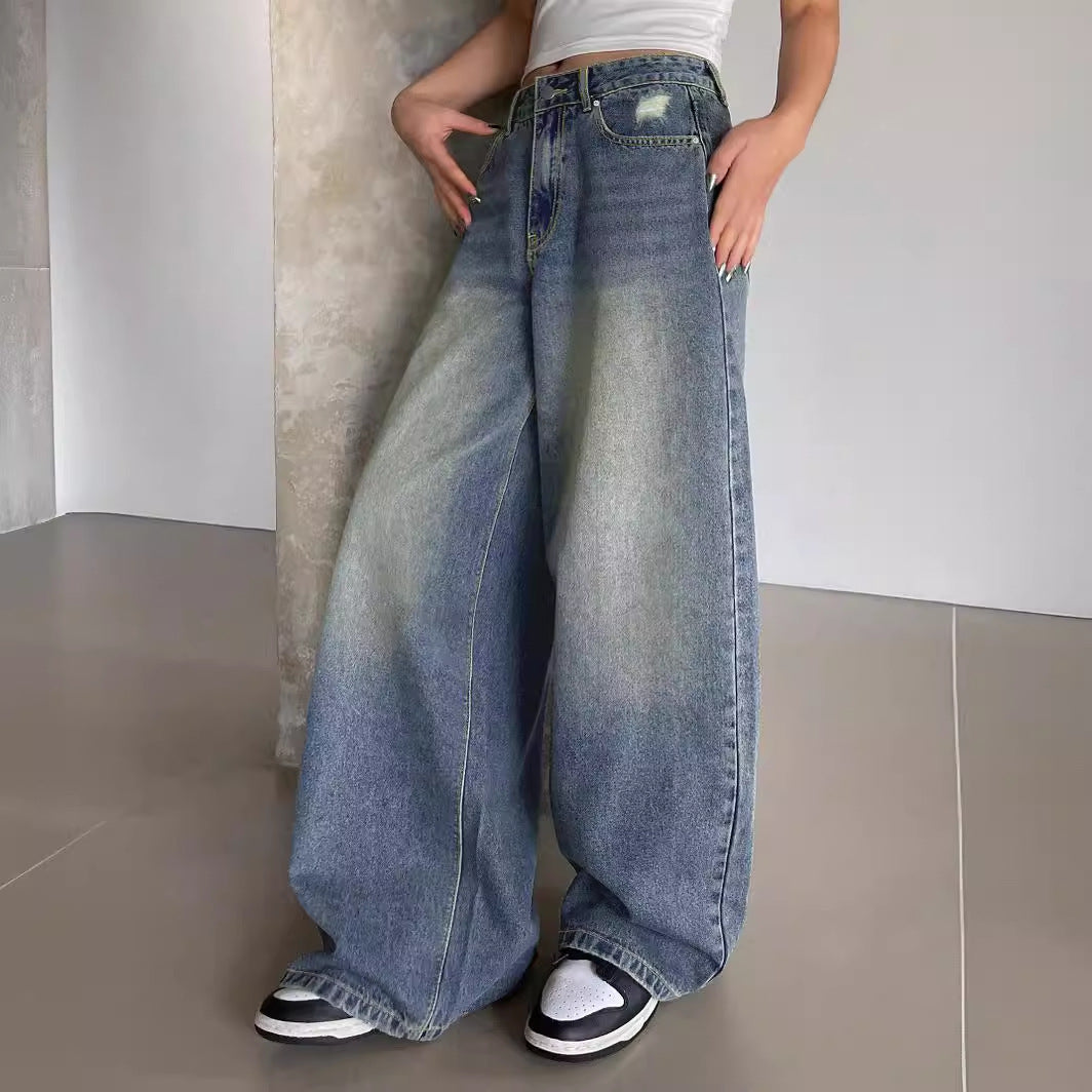 Vandvaskede blå ekstra lange jeans med brede ben og gulvlængde