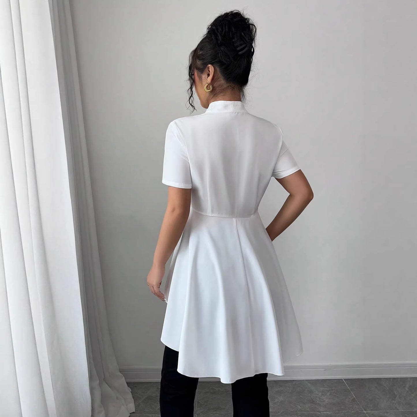 Elegant And Stylish Casual Shirt With A Symmetrical Hem