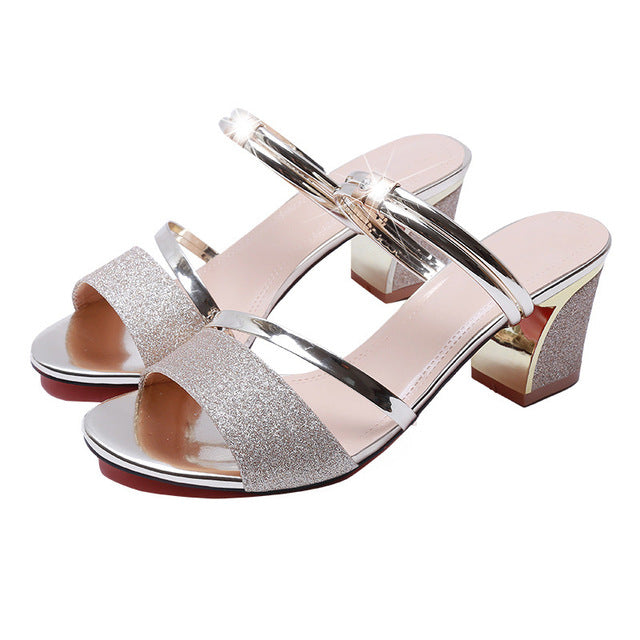 Two wearing sandals and slippers high heel