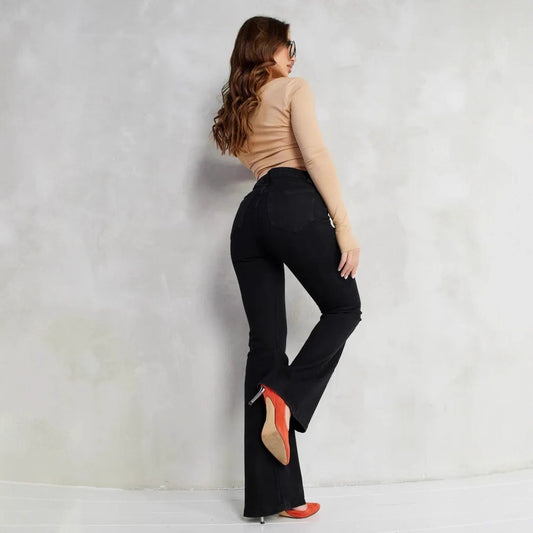 Flared jeans til efteråret, denim bukser til kvinder