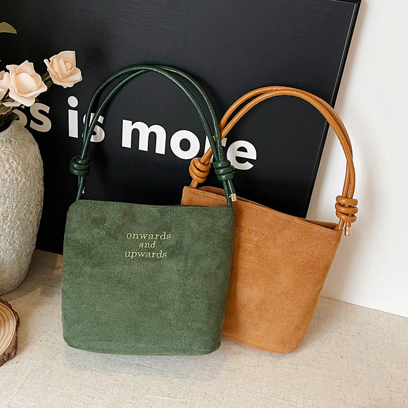 Ny skuldertaske i vintage ruskind til kvinder – en supertrendy must-have bucket-taske