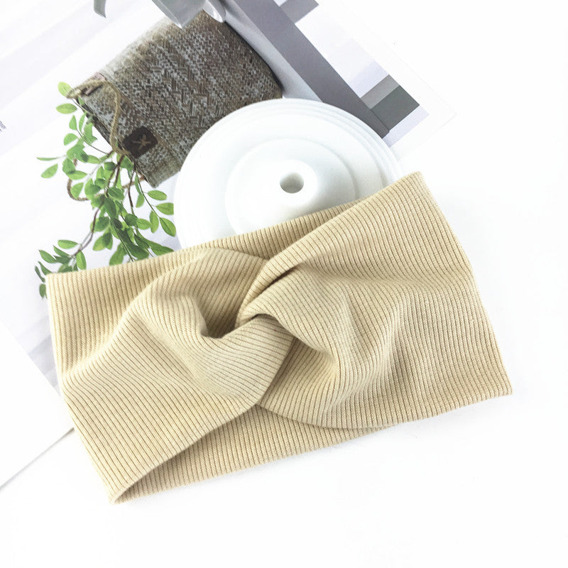 Wide side stretch knitted headband