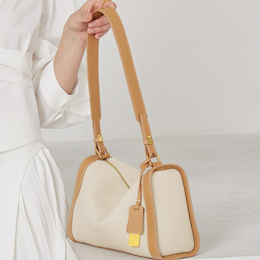 En skulder-crossbody taske er moderne og alsidig