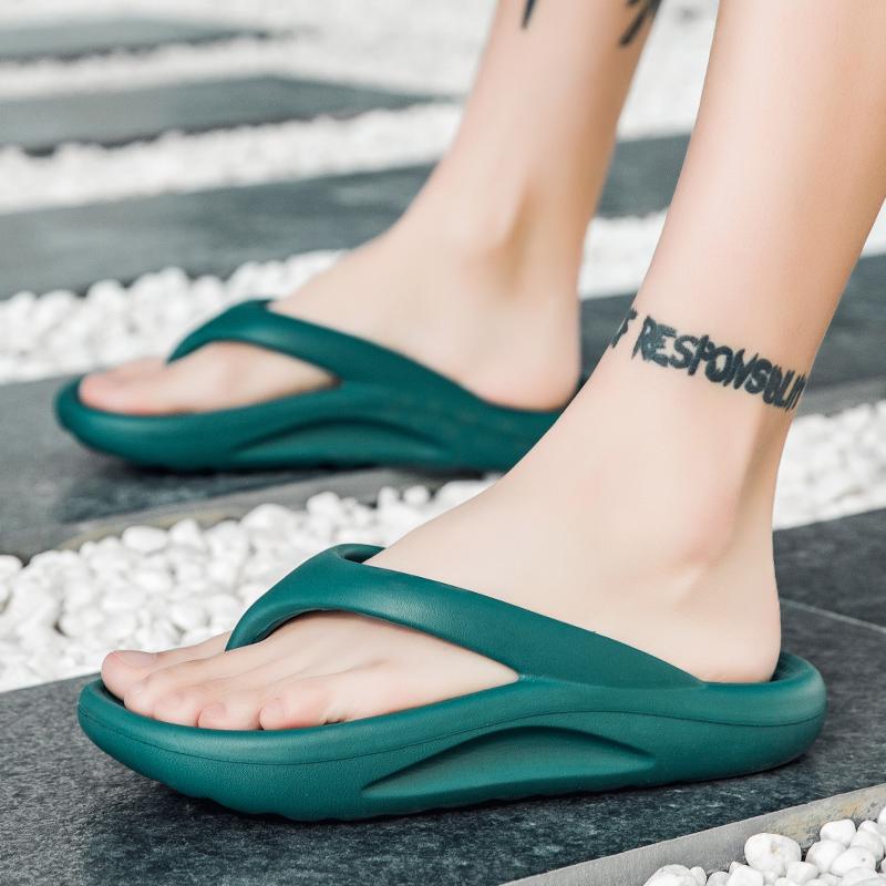 Flip-flops Men Wear Sandy Beach Platform Outside And Step On Shit