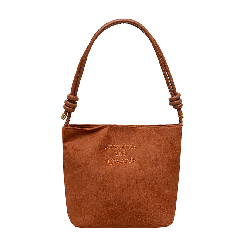 Ny skuldertaske i vintage ruskind til kvinder – en supertrendy must-have bucket-taske