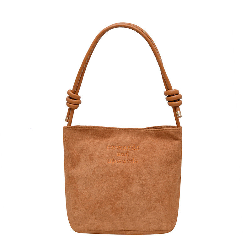 Ny skuldertaske i vintage ruskind til kvinder – en supertrendy must-have bucket-taske