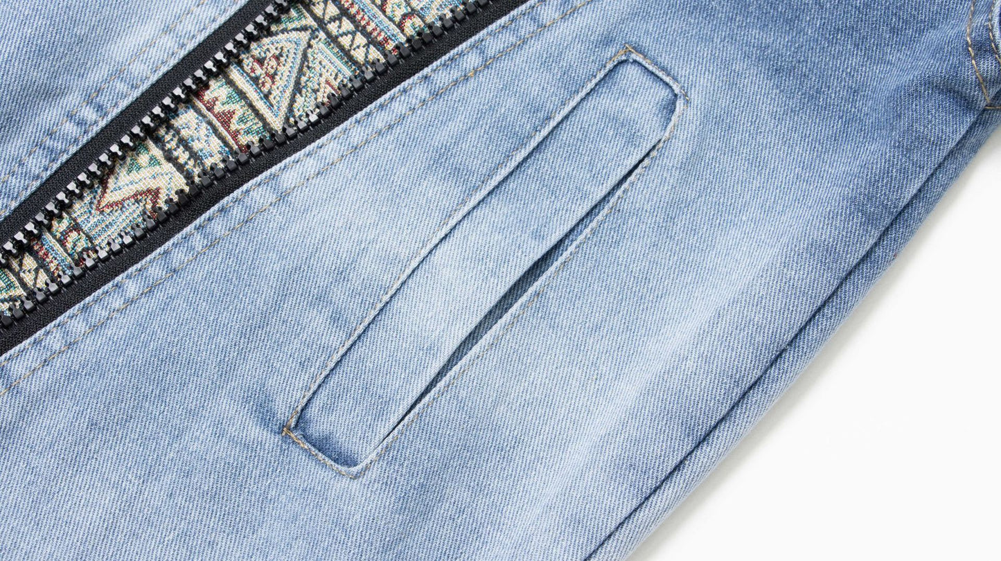 Jakke i denim med lynlåslukning og syninger
