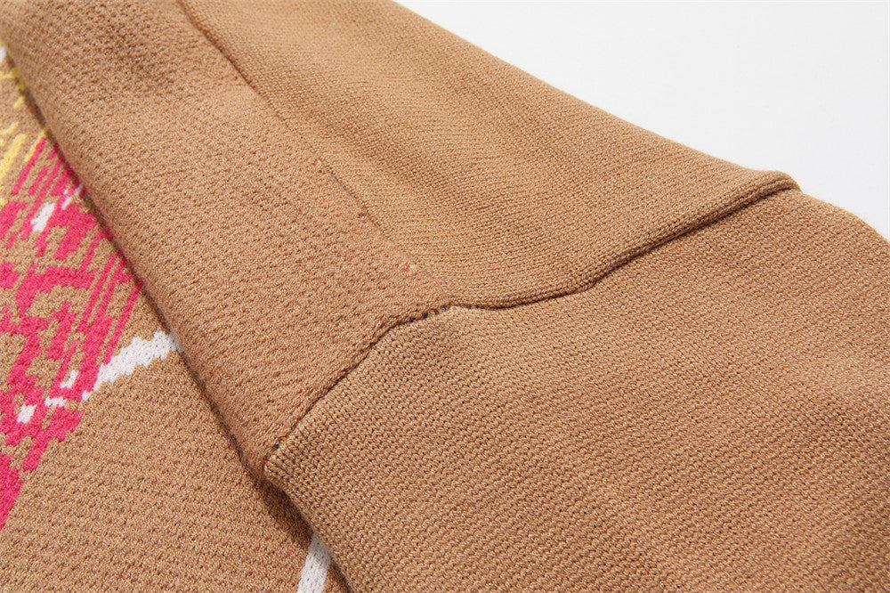 Striktrøje med stjernekors og rund hals fra Trendy Brand