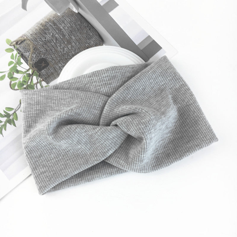 Wide side stretch knitted headband