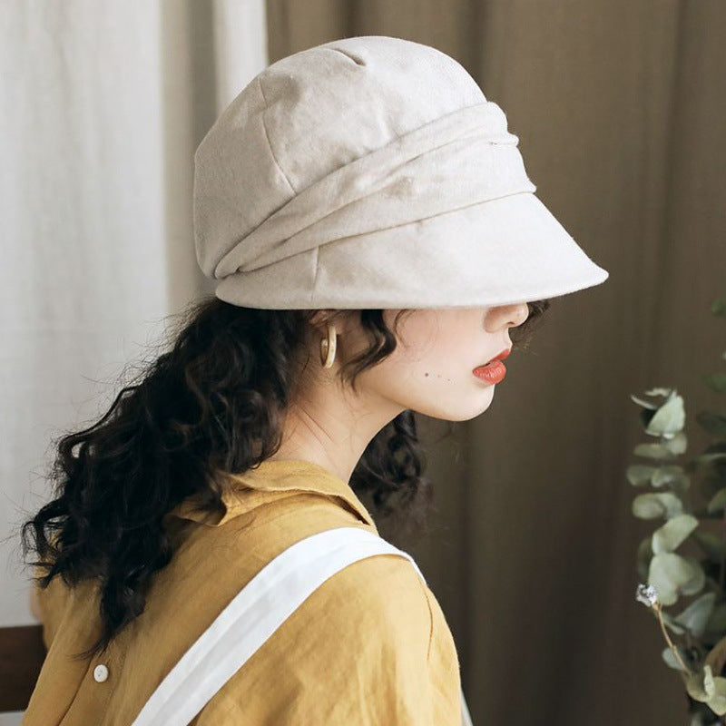 Kunstnerisk afslappet bøllehat med top og krøllet vintage-look