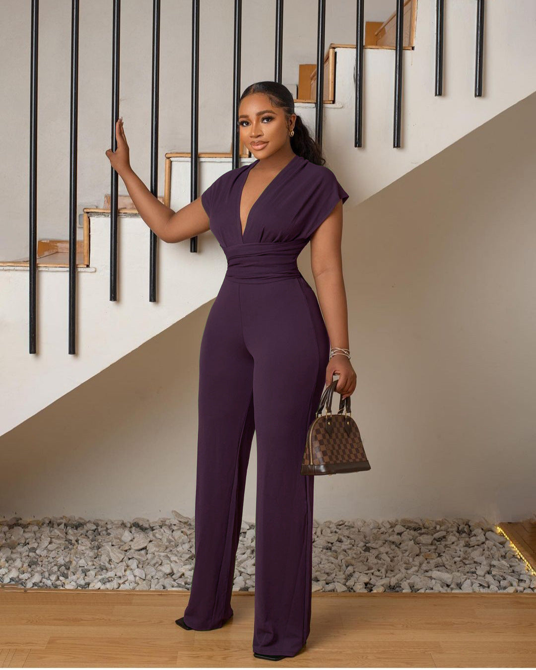 Dame Jumpsuit med ensfarvet talje