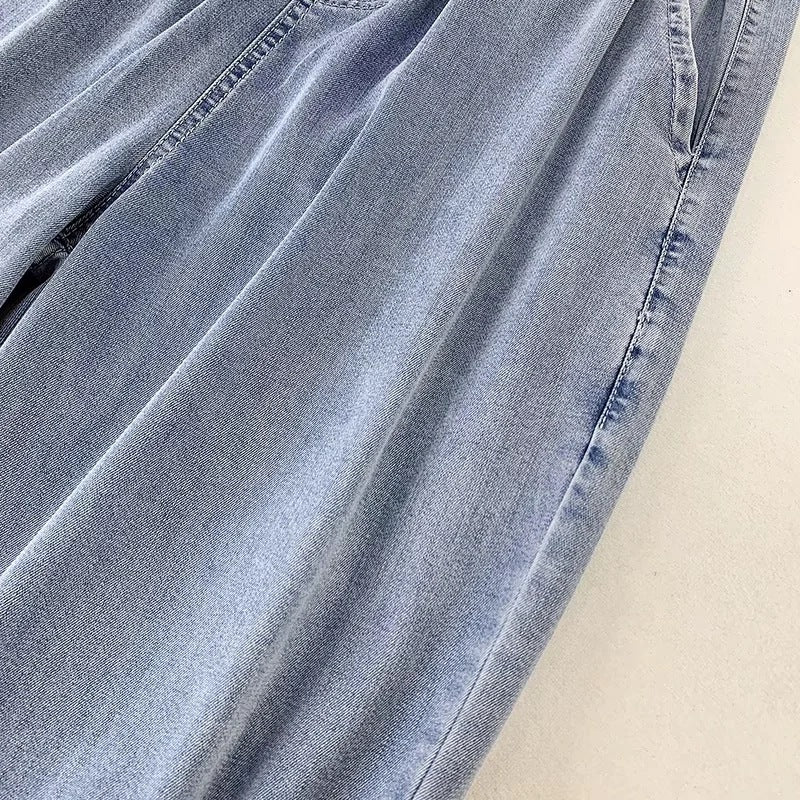 Damebukser i denim med snøre og brede ben