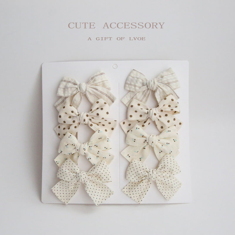 Dovetail Bow Around A Pair Of Hairclips 1 Group