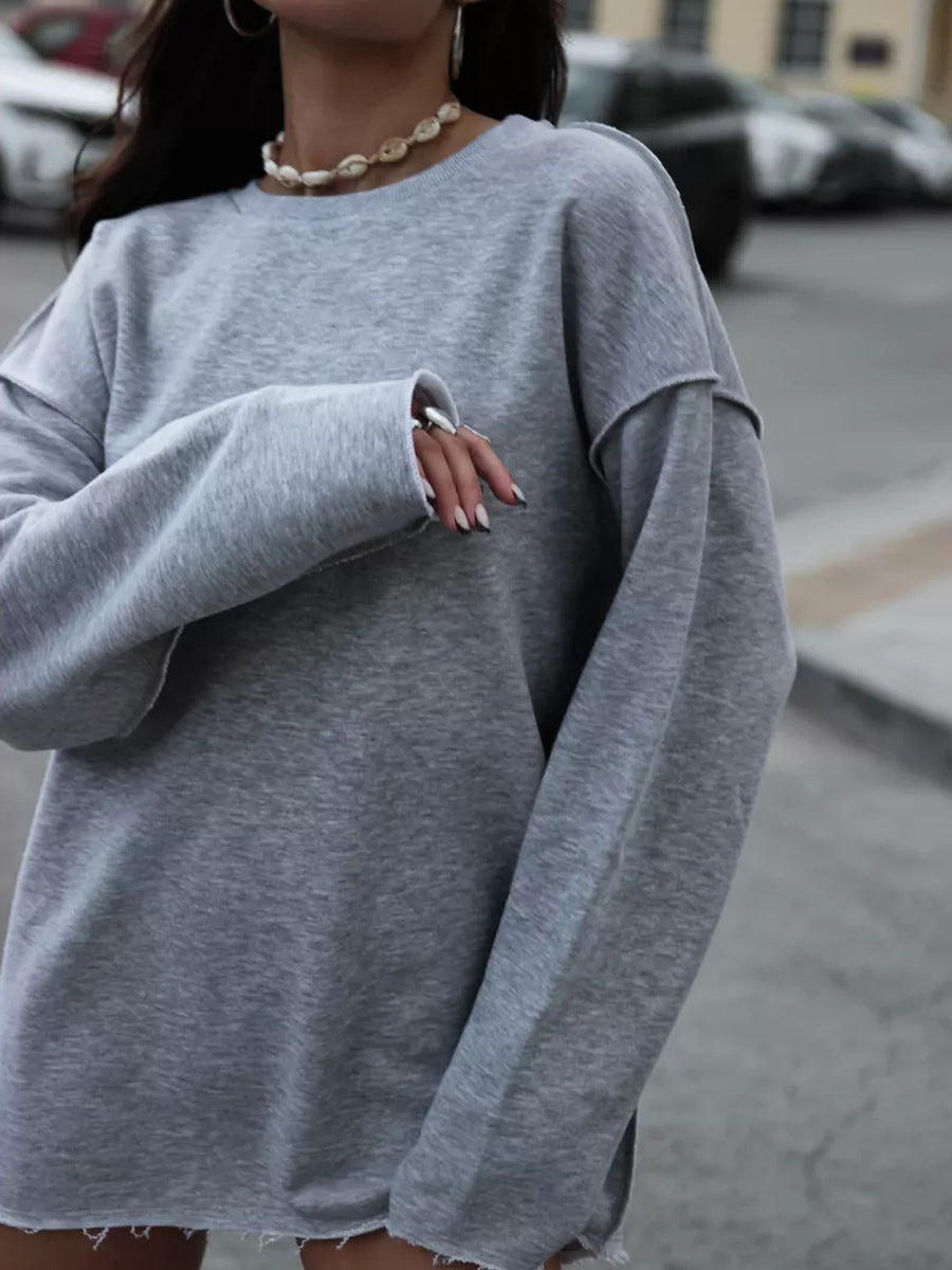 Afslappet ensfarvet langærmet sweatshirt med rund hals