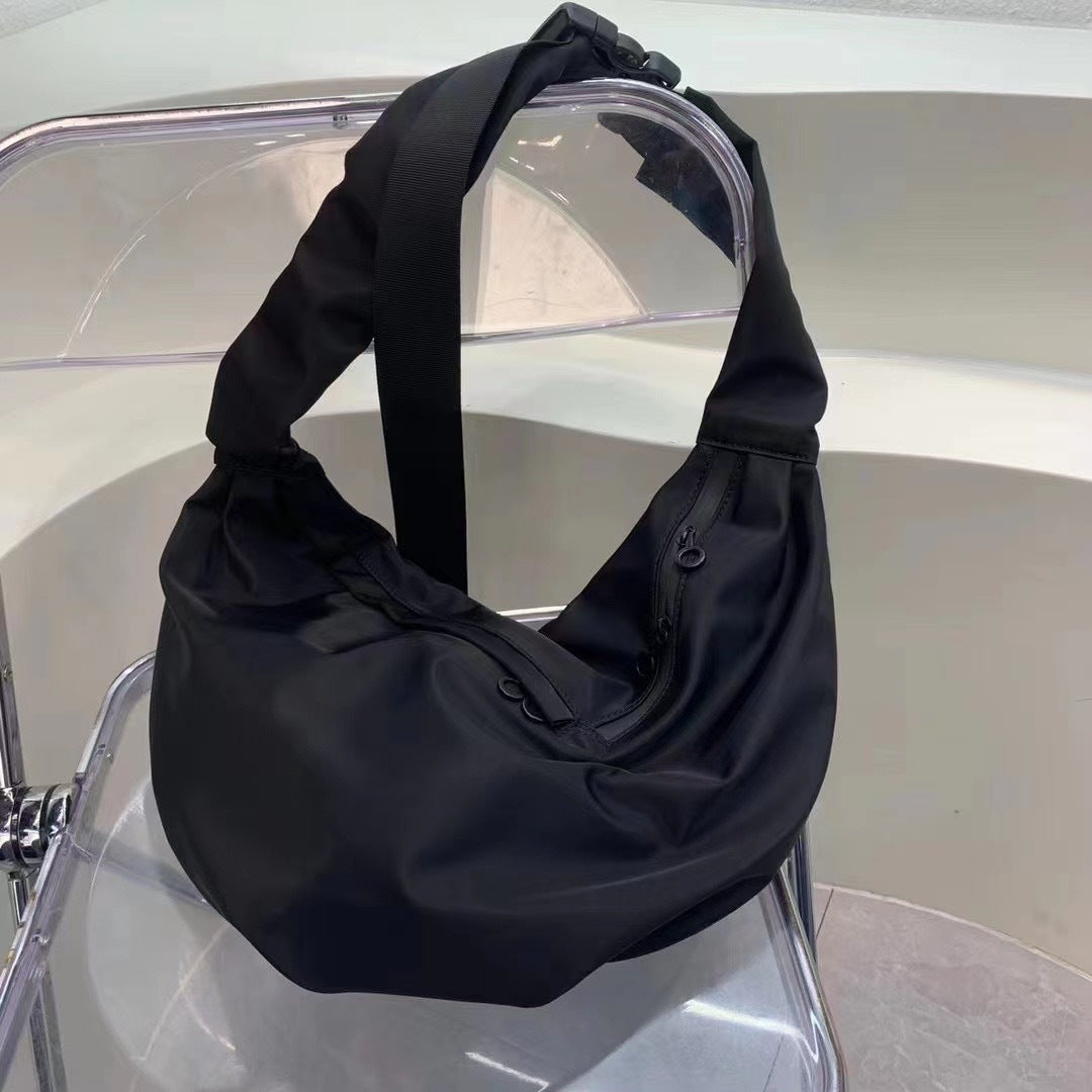 Brede skulderremme, cross-body-dumplings
