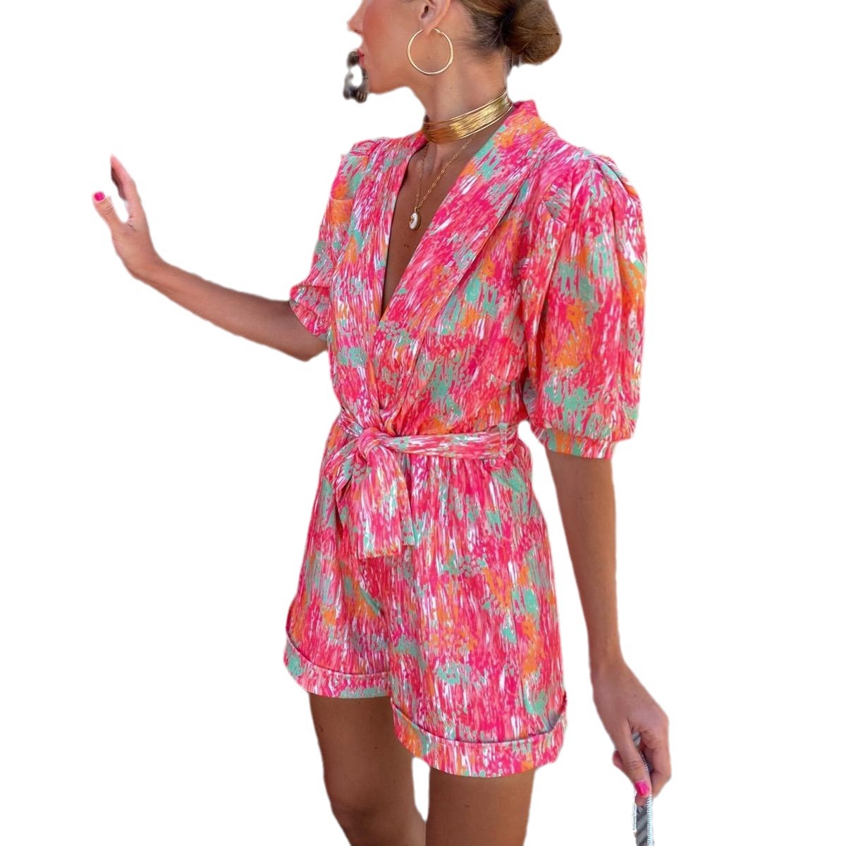 Jumpsuit med dyb V-hals, pufkortærmer, print, elastisk talje og lommer