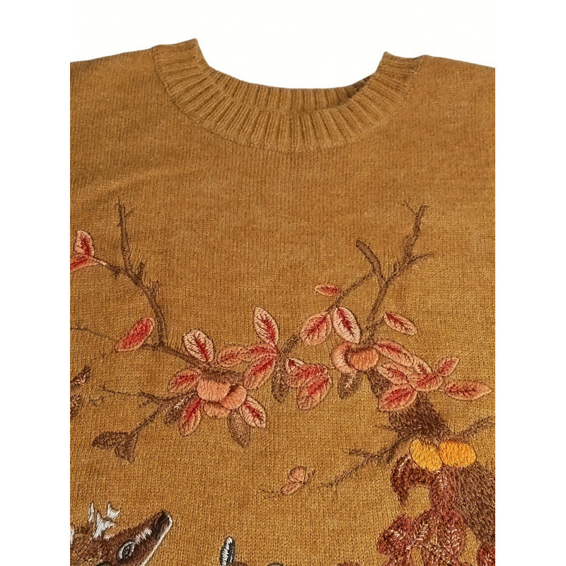 Løstsiddende kortærmet sweater med broderet hjorteblomme