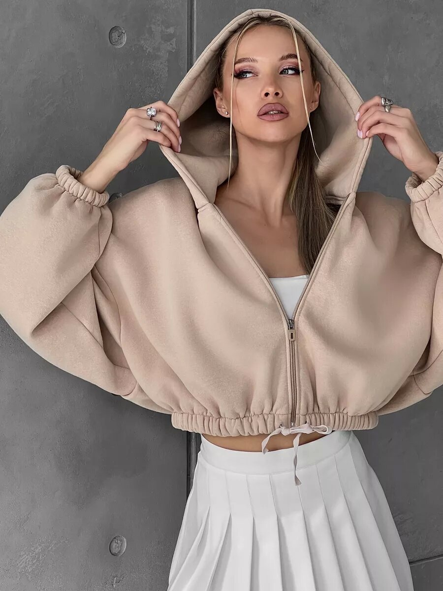 Cropped Fitted Hoodie With A Drawstring Hood And Long Sleeves Perfect For Casual Wear