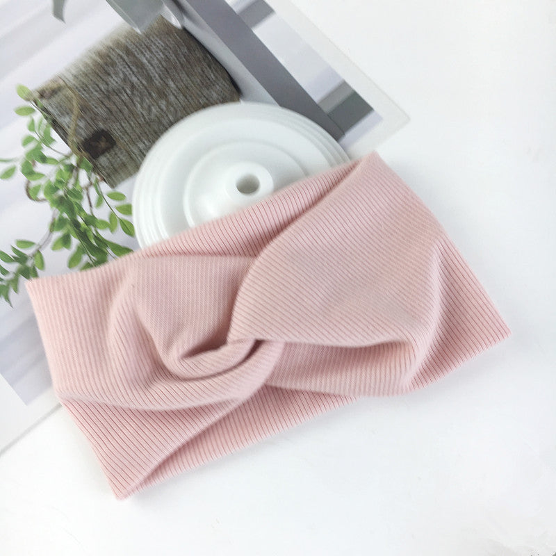 Wide side stretch knitted headband