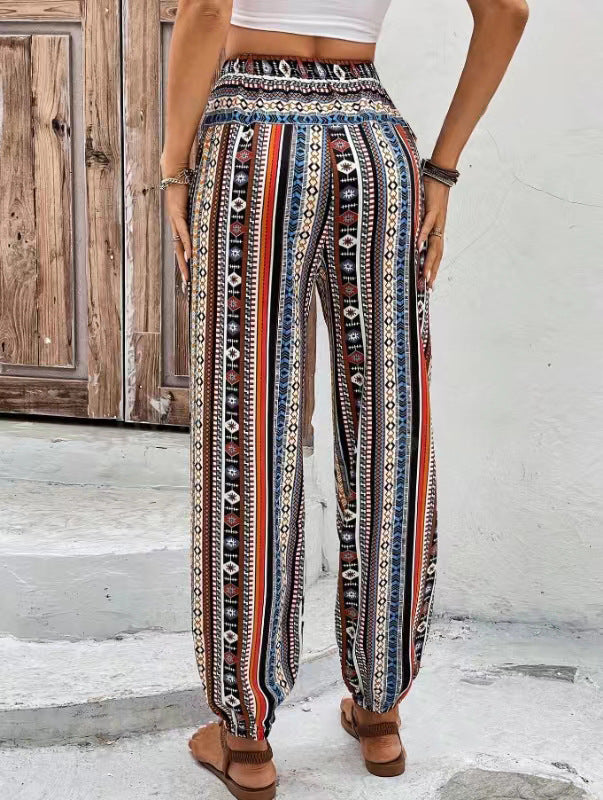 Løs, tilspidset jumpsuit med print, snøre, blomsterprint og lommer