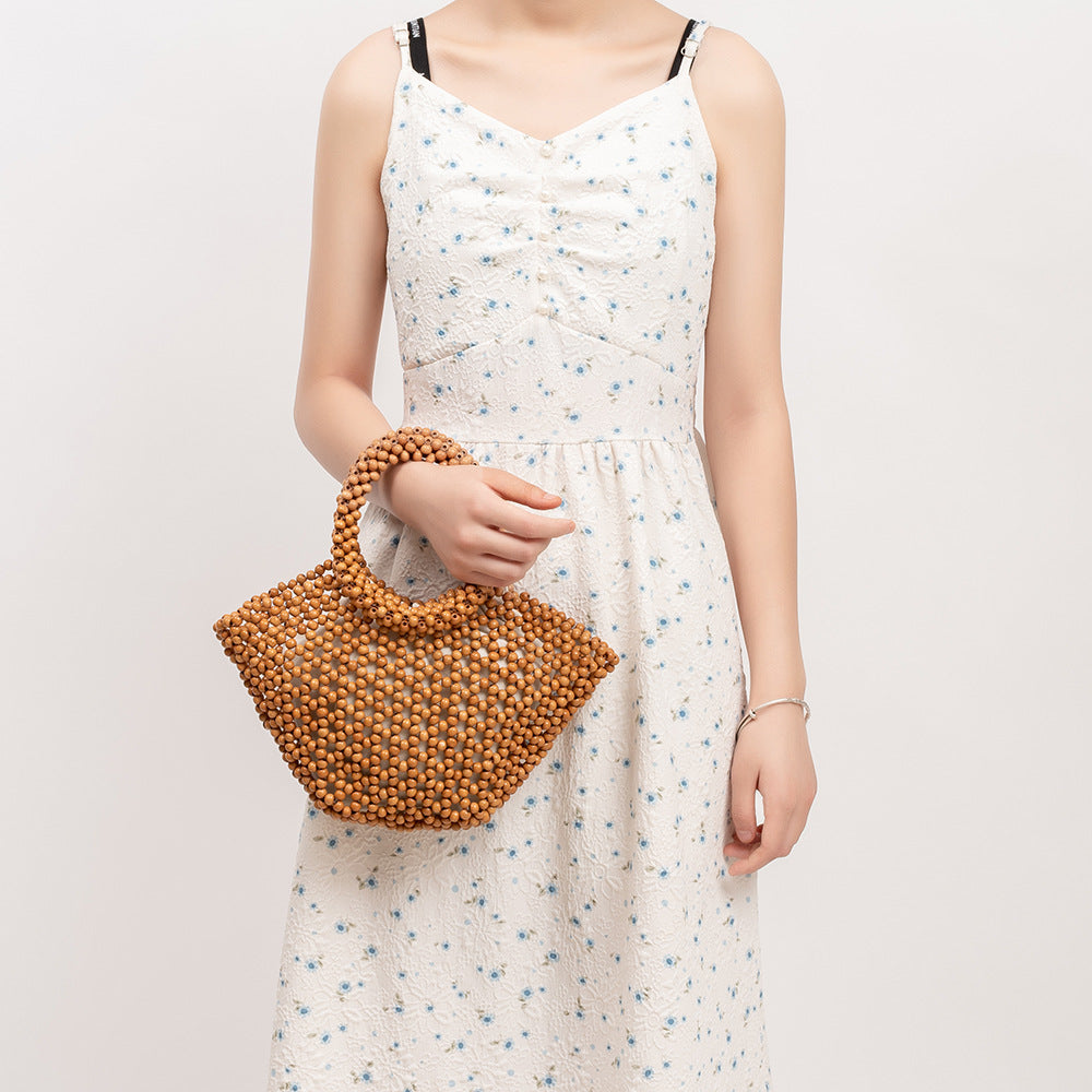 Hand-woven Seaside Beach Vacation Hollow Handbag With Wooden Beads Decoration