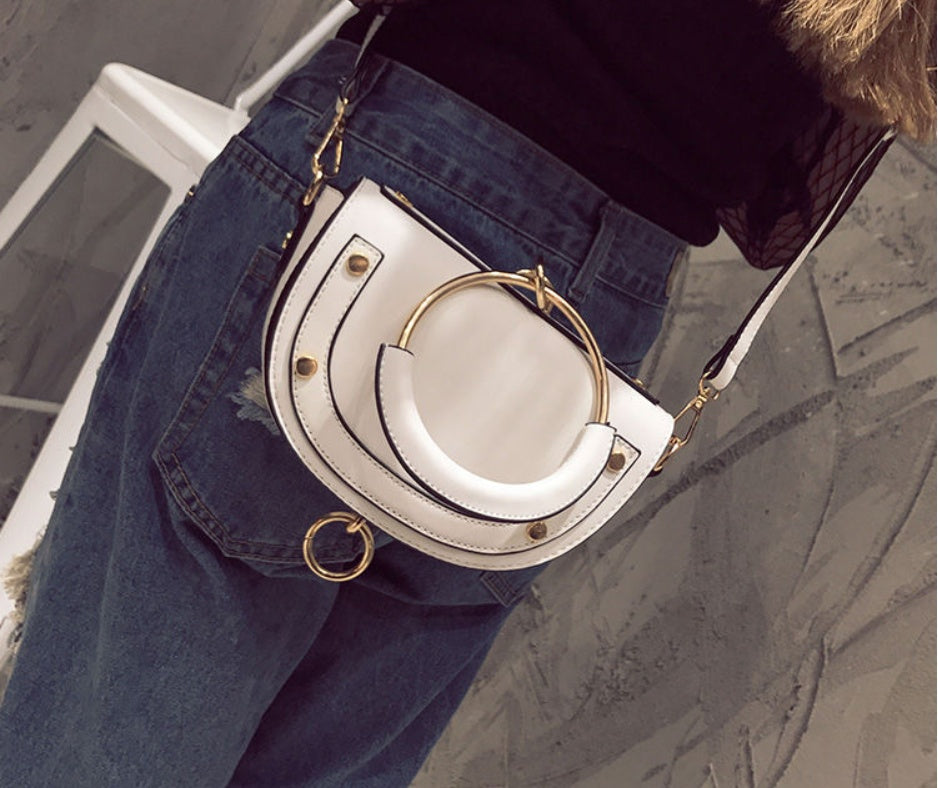 2007 New Ring Handbag Fashion 100 Rivet Saddle Bag Tang Yan Same Shoulder Skew Bag Tide