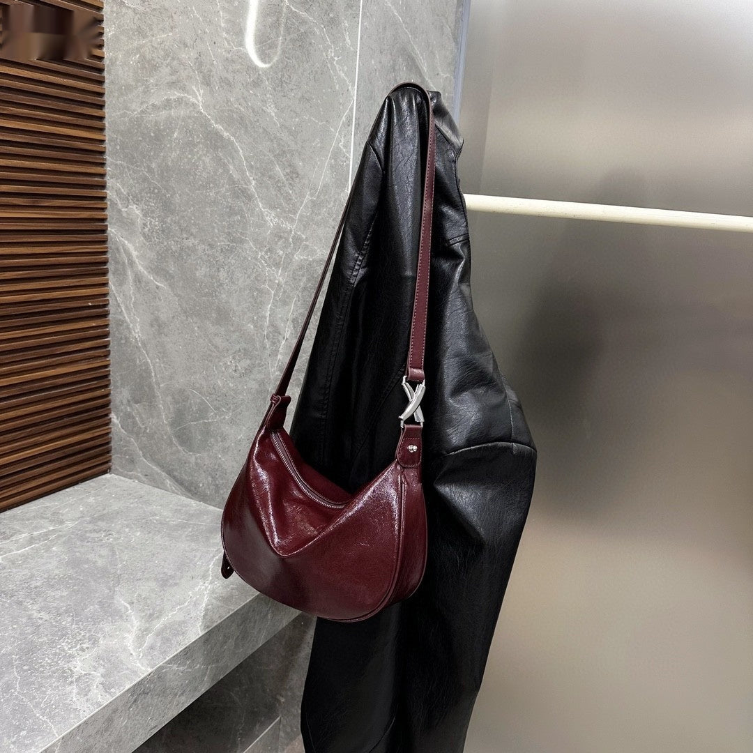 Dametaske i koskind, skuldertaske, crossbody, olievokset læderspandtaske