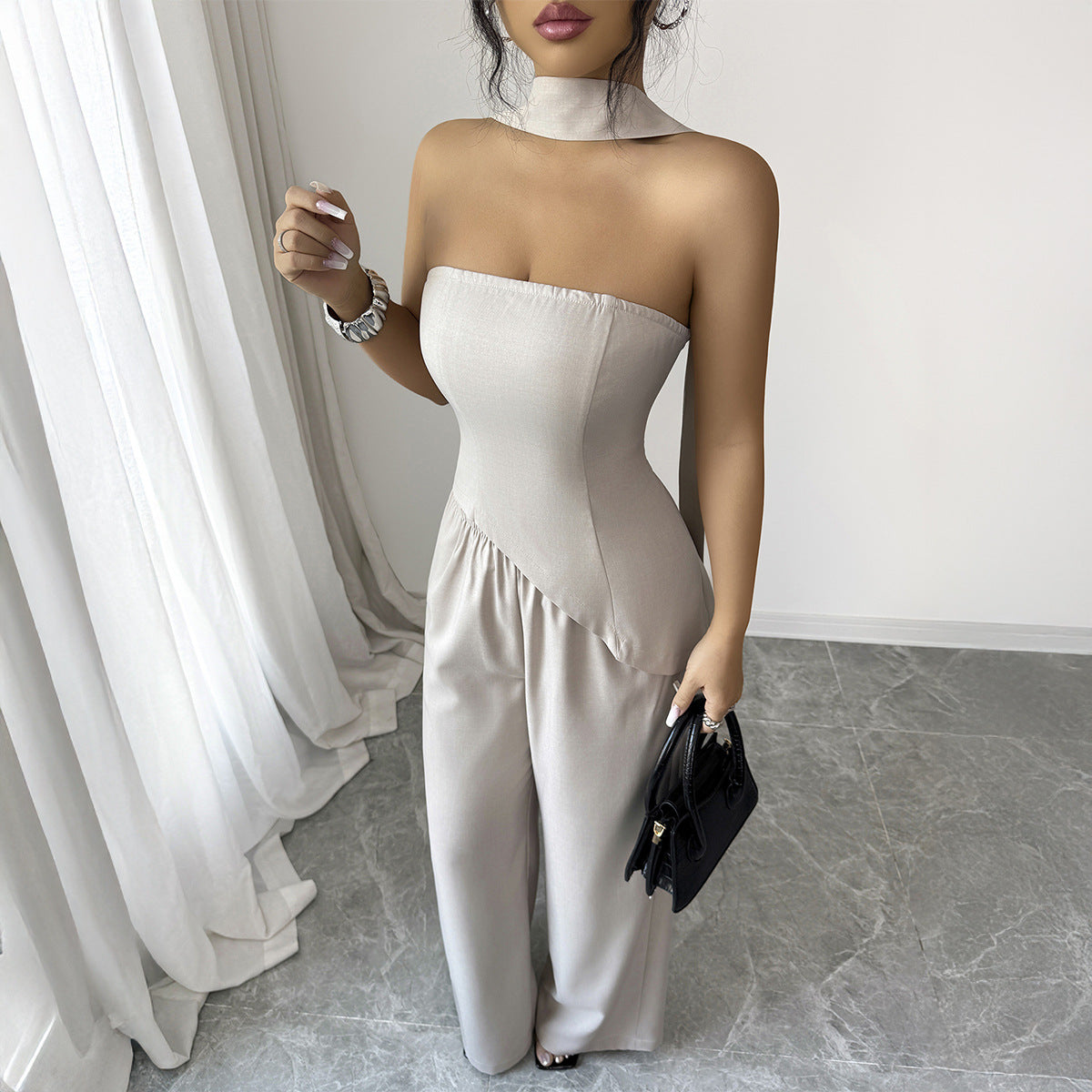 An Elegant And Sophisticated Midriff-baring Top And Bottom Set