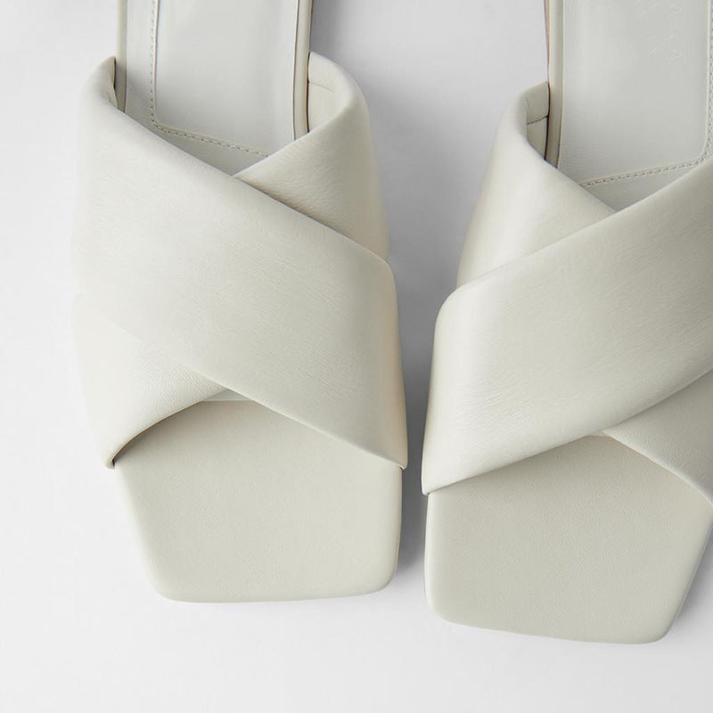 Nude quilted calfskin flat sandals