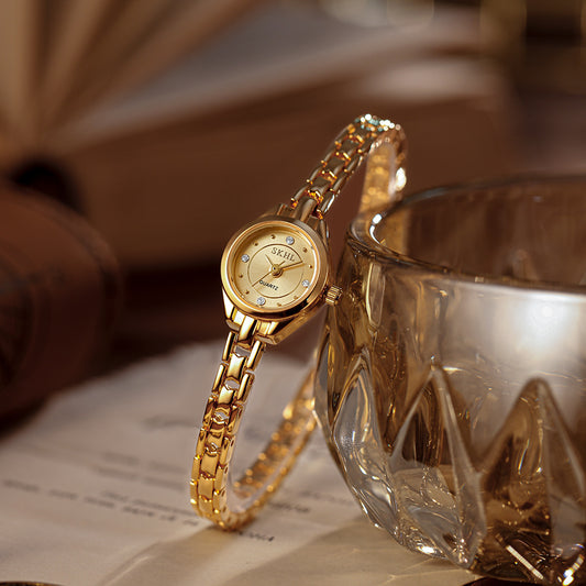 Mid-ancient Simple And Light Luxury Quartz Mini Round Elegant Steel Belt Casual Women's Watch
