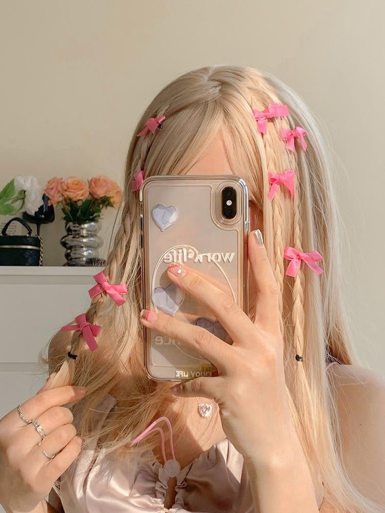 8 Pink Ribbon Bow Hair Clips On The Forehead