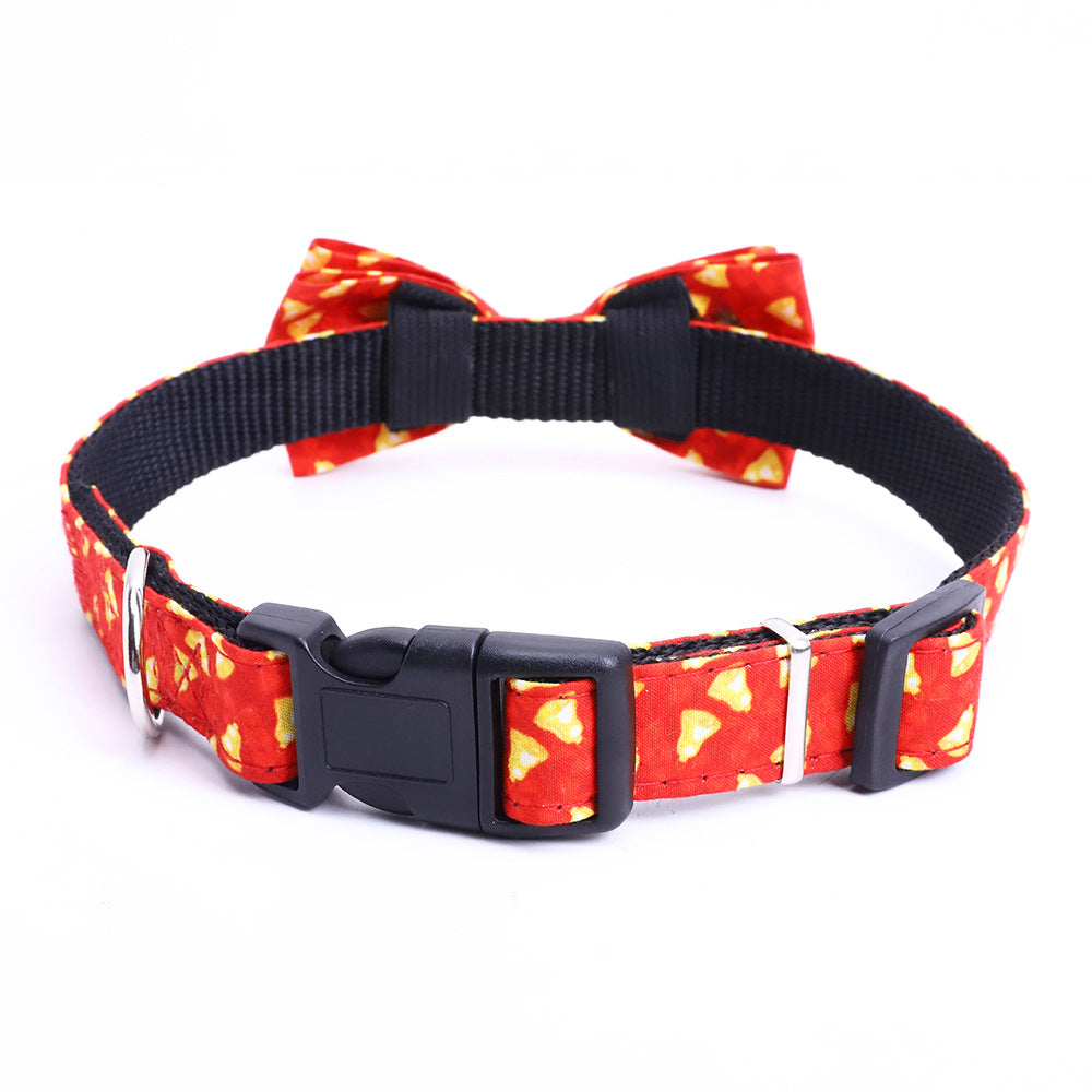 A Large Dog Bow On A Christmas Pet Collar
