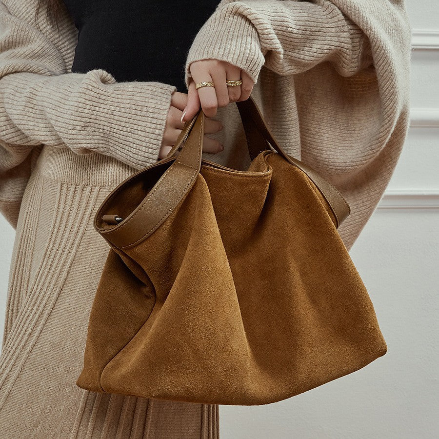 Pendlertaske med stor kapacitet og premium-fornemmelse
