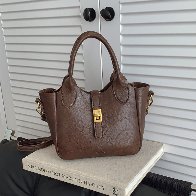 Light Luxury Hand-held Bucket High-end Sense Shoulder Crossbody Bag