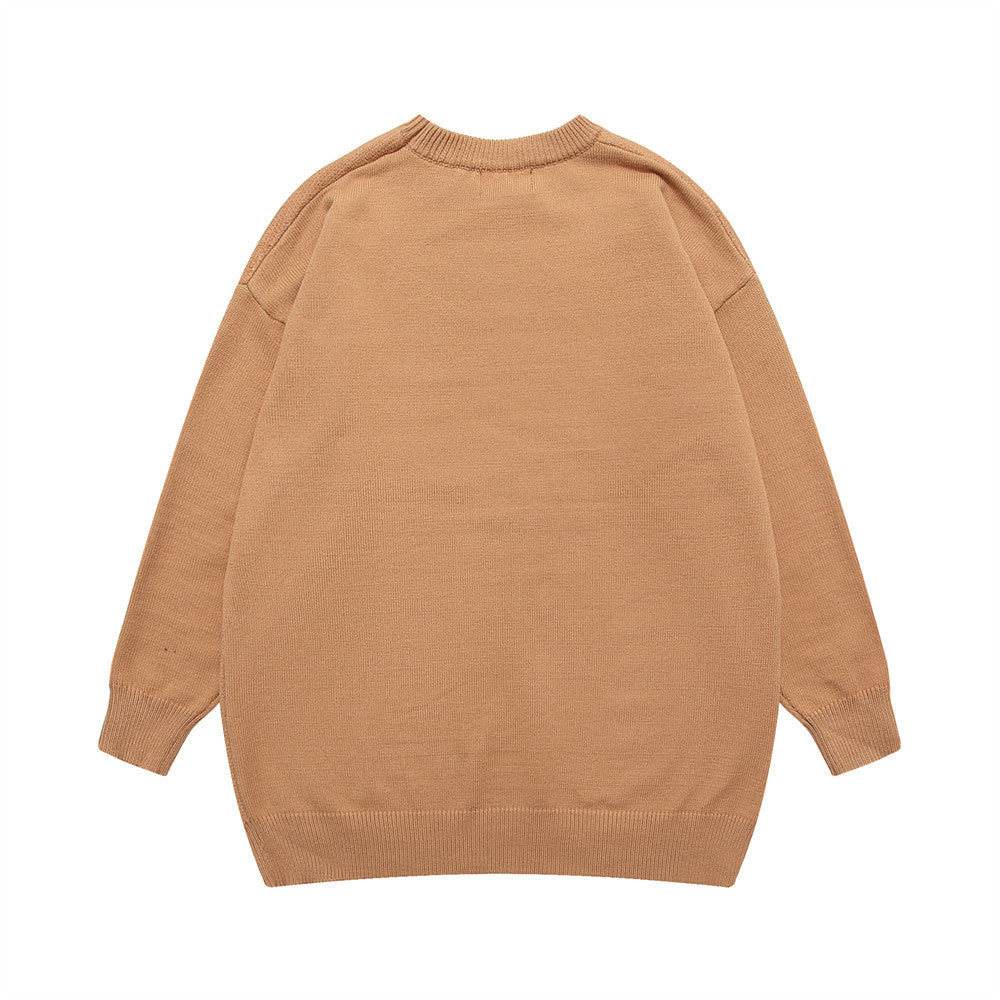 Striktrøje med stjernekors og rund hals fra Trendy Brand