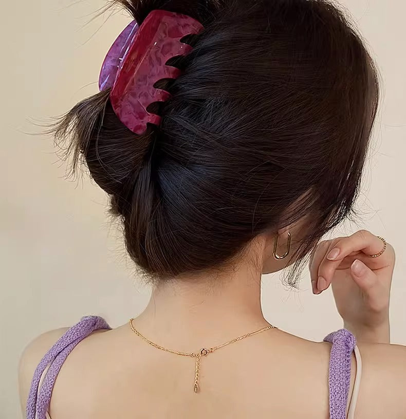 White Dragon Fruit Colored Hair Clip With A Spoon On The Back Of The Head