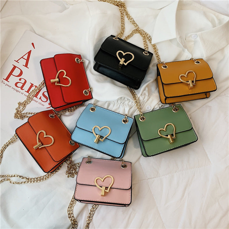 Children's Solid-color Shoulder Bag Fashion Love Hardware Decoration